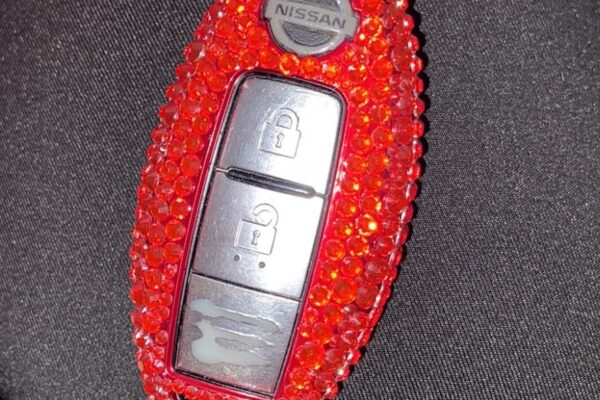 Red nissan key cover